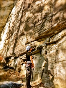 Climbing many times requires mental focus, here eyeing out a climb and contemplating
